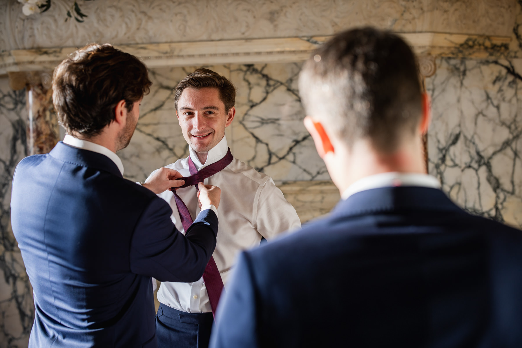 The groom getting ready at Balcombe Place