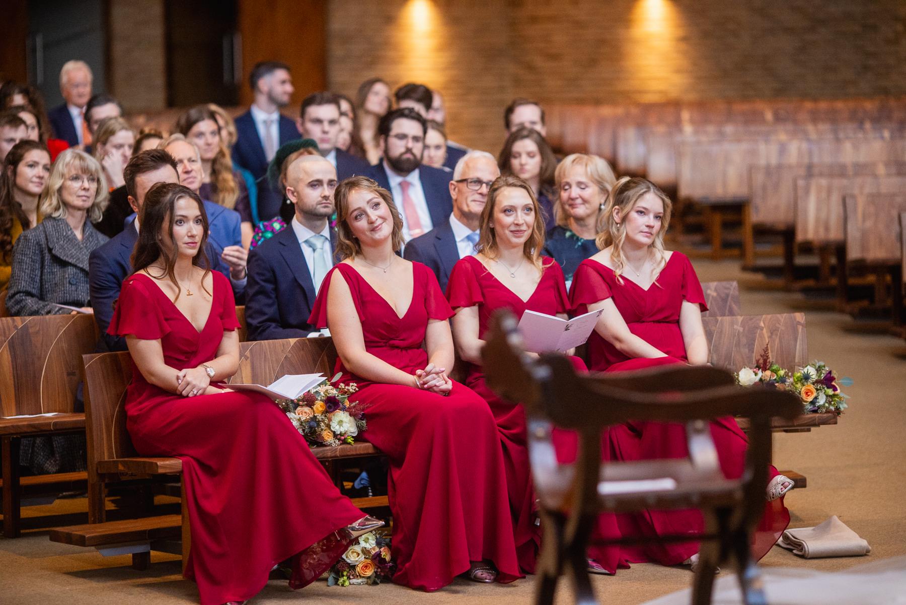 Wedding guests looking on lovingly