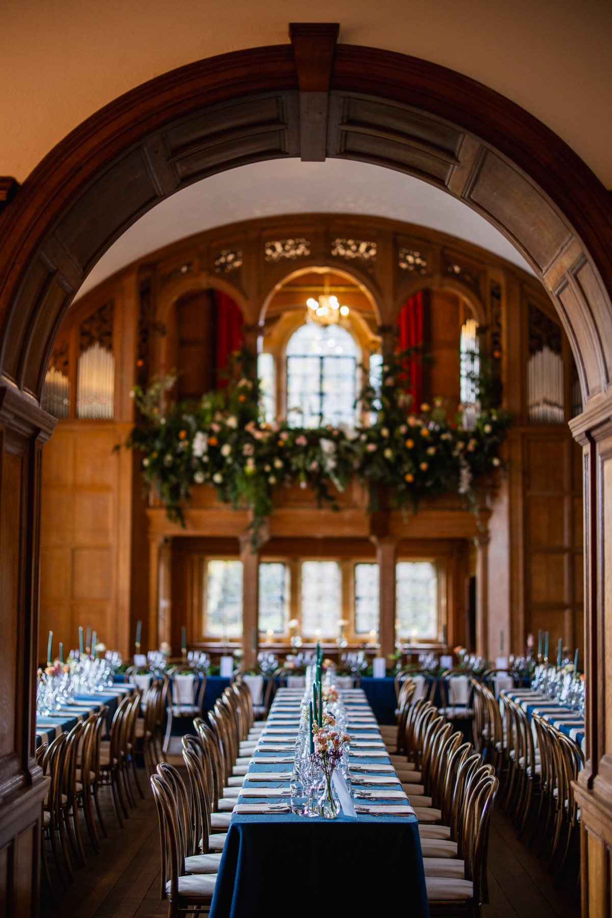 The reception room at Balcombe Place decorated in Blues and soft pink flowers