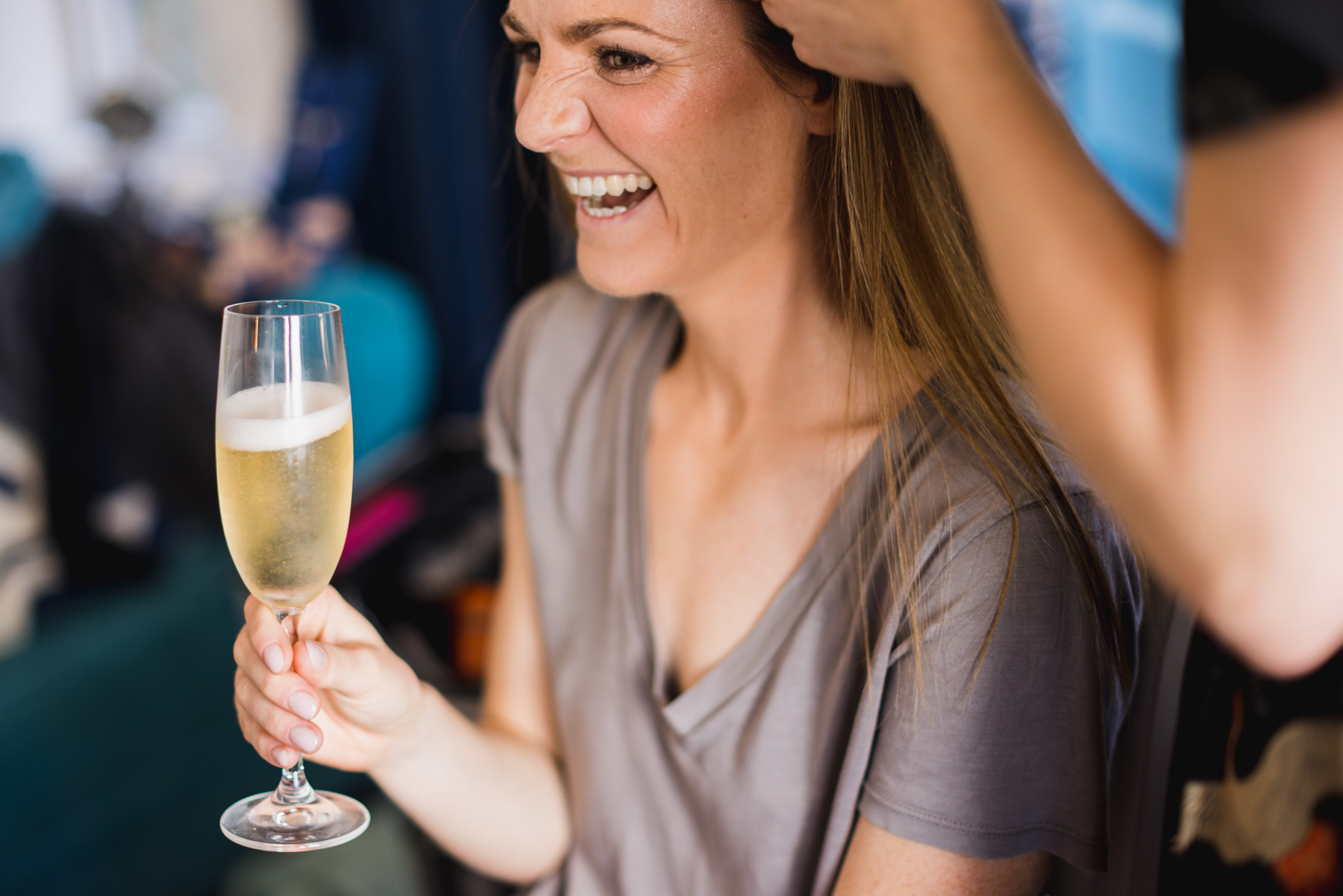 Bride getting makeup at Blue Doors Barn