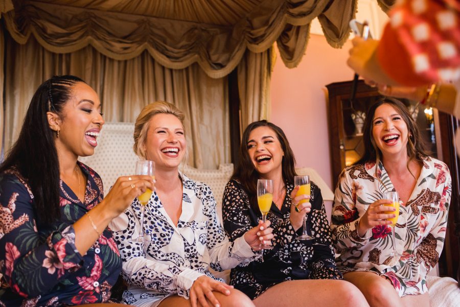 Bride and bridesmaids getting ready ahead of a Balcombe Place Wedding